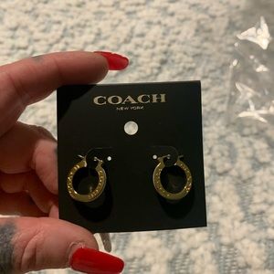 Women’s Coach earrings